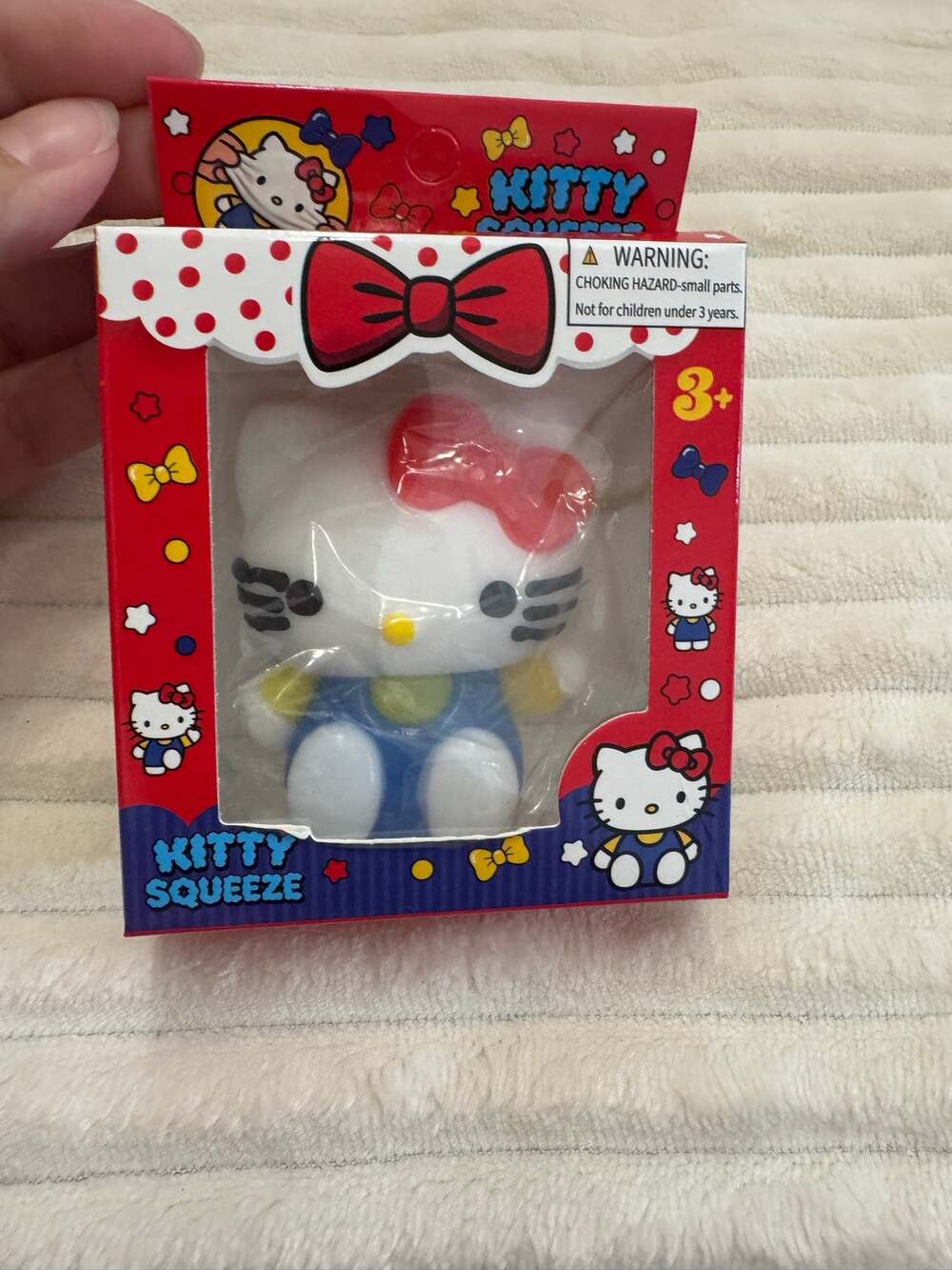 Hello Kitty squishy toy in blue & white with red bow kawaii